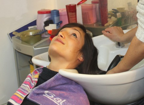 WONDERFUL YOUNG LADY BEING SHAMPOOED