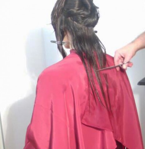 UNDER THE TOWEL IS THE SECRET OF A MAGIC HAIRCUT